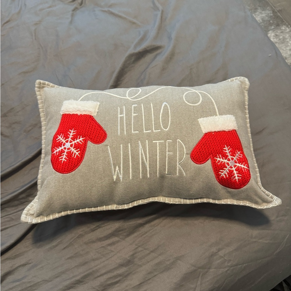 NWOT “Hello Winter” grey throw pillow with red mitten accents